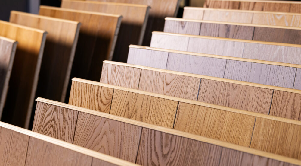 laminate flooring samples in interior design shop. banner copy space